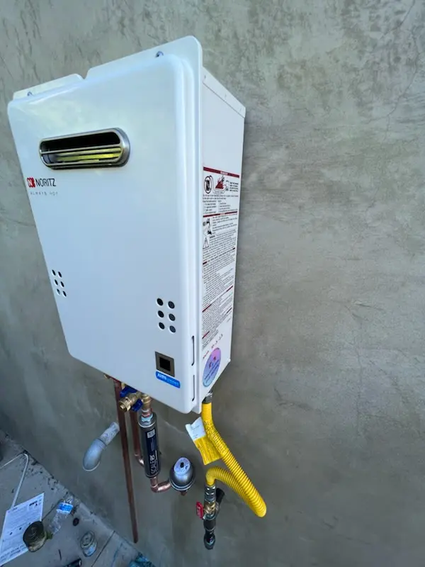 Tankless water heater installation for Damson-Logan homes